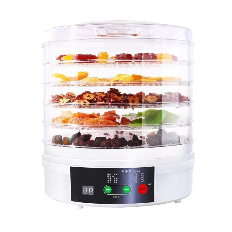 Household food dehydrator with multiple stackable drying trays on a kitchen worktop.