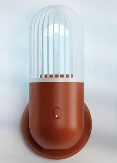 Portable capsule ultraviolet disinfection lamp in black, brown, green or white with dimensions 52x52x136mm