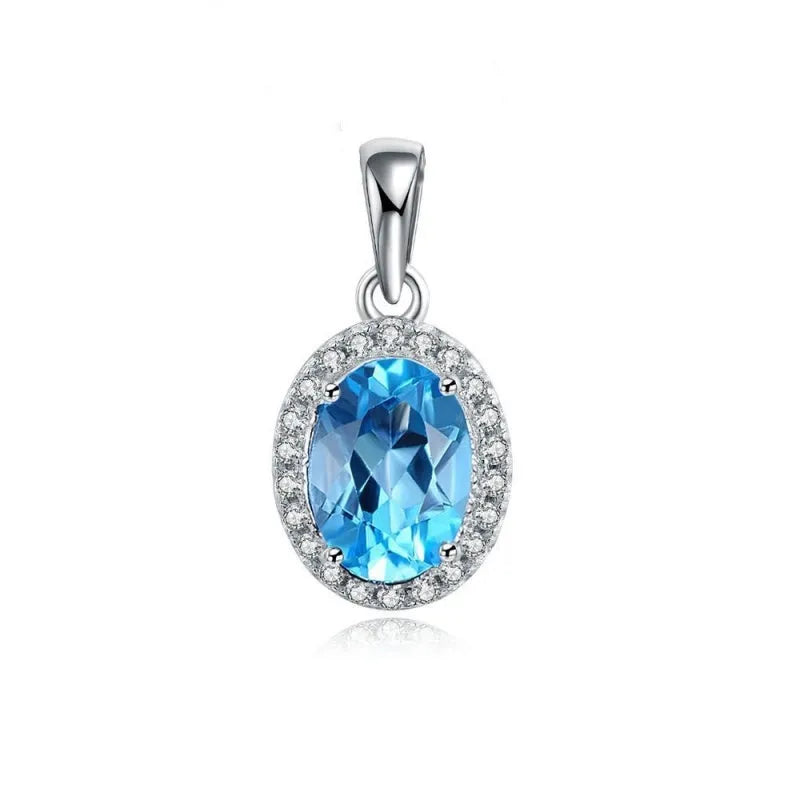 925 sterling silver jewellery set with blue topaz stones including geometric earrings, necklace, ring and pendant