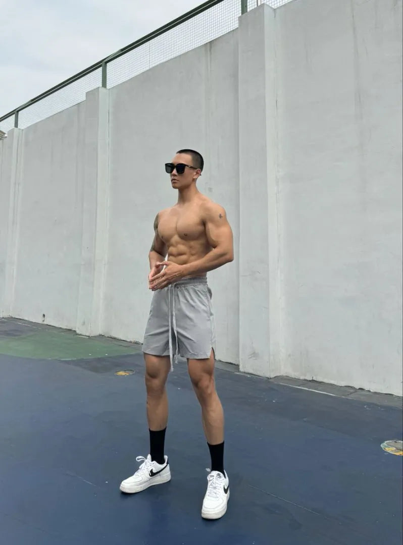 Men's ice silk quick-drying double-layer casual shorts in multiple colours.