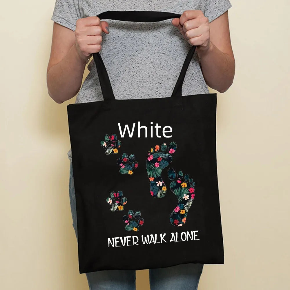 Sausage dog printed canvas bag in black with white dog design on front, sturdy tote for everyday use