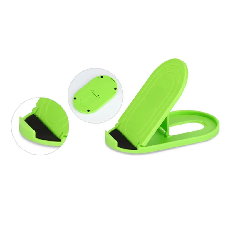 Plastic lazy bracket mobile phone stand shown in one of six available colours: black, blue, grey, pink, white, or yellow.