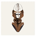 Gold handmade halter neck one-piece swimsuit with hollow-out design on mannequin