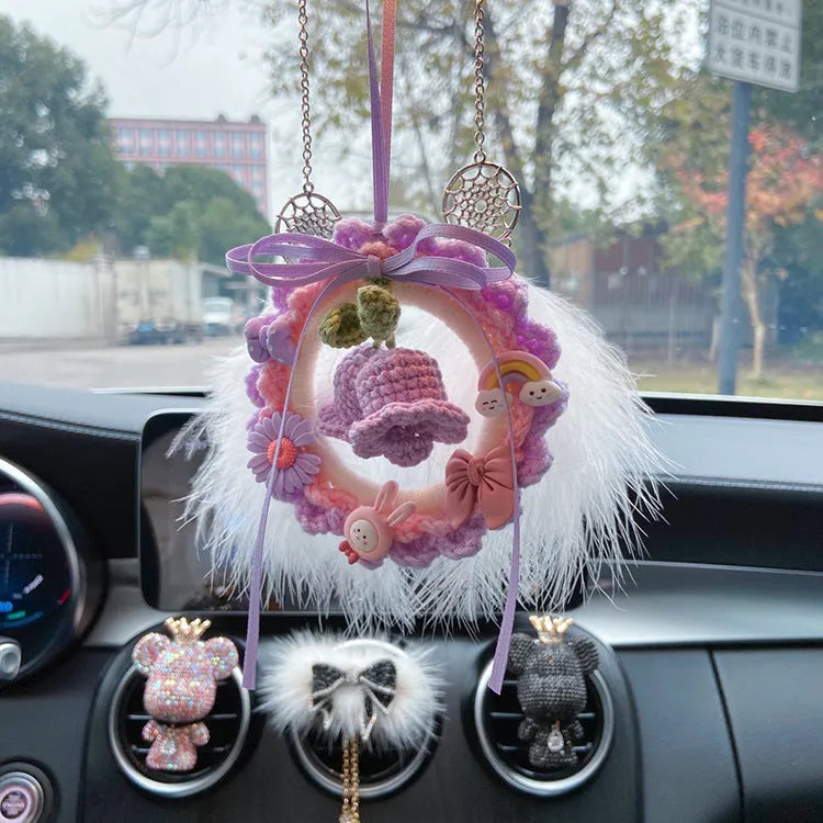 Woven wool bell orchid car pendant in green, pink, purple, and yellow colour options with dream catcher variations