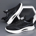 Men's low-top casual shoes in black with breathable mesh upper and rubber sole