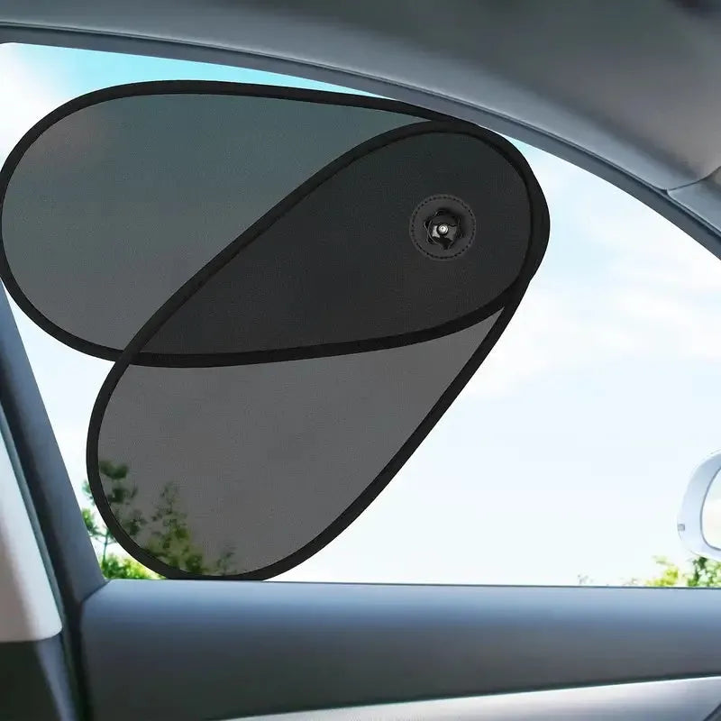 Black breathable car window shade with suction cups attached to vehicle side window