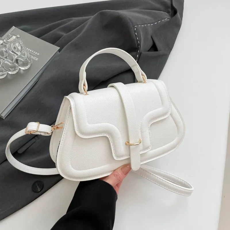 PU leather horizontal square casual handbag with stitching detail in black