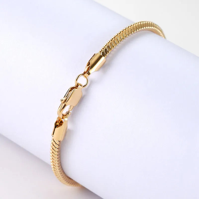 Stainless steel snake chain bracelet in silver tone, geometric line design with electroplated finish