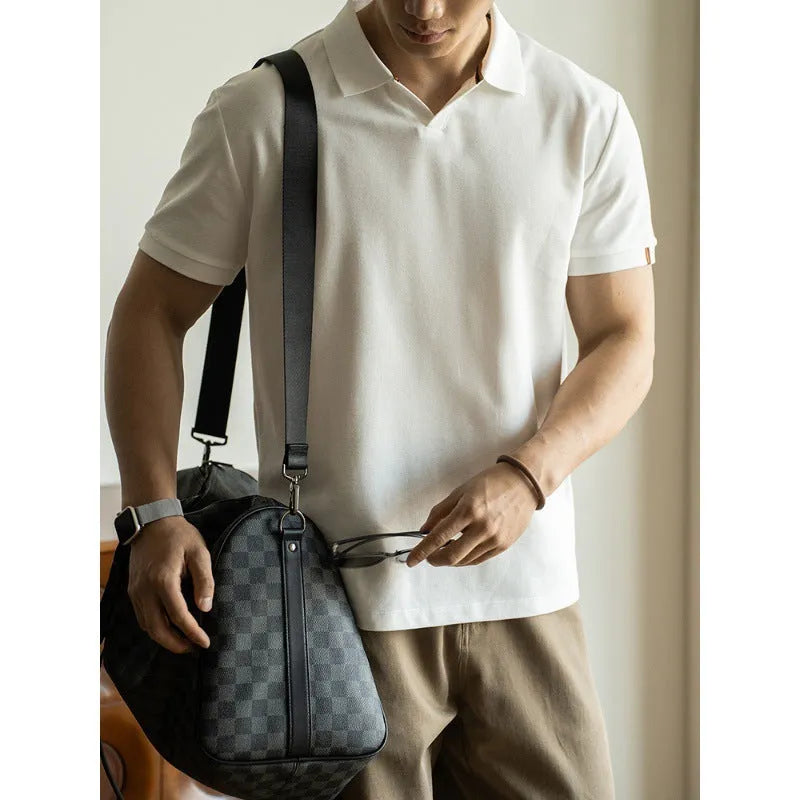American-style short-sleeved polo shirt in blue, black, or white on a hanger.