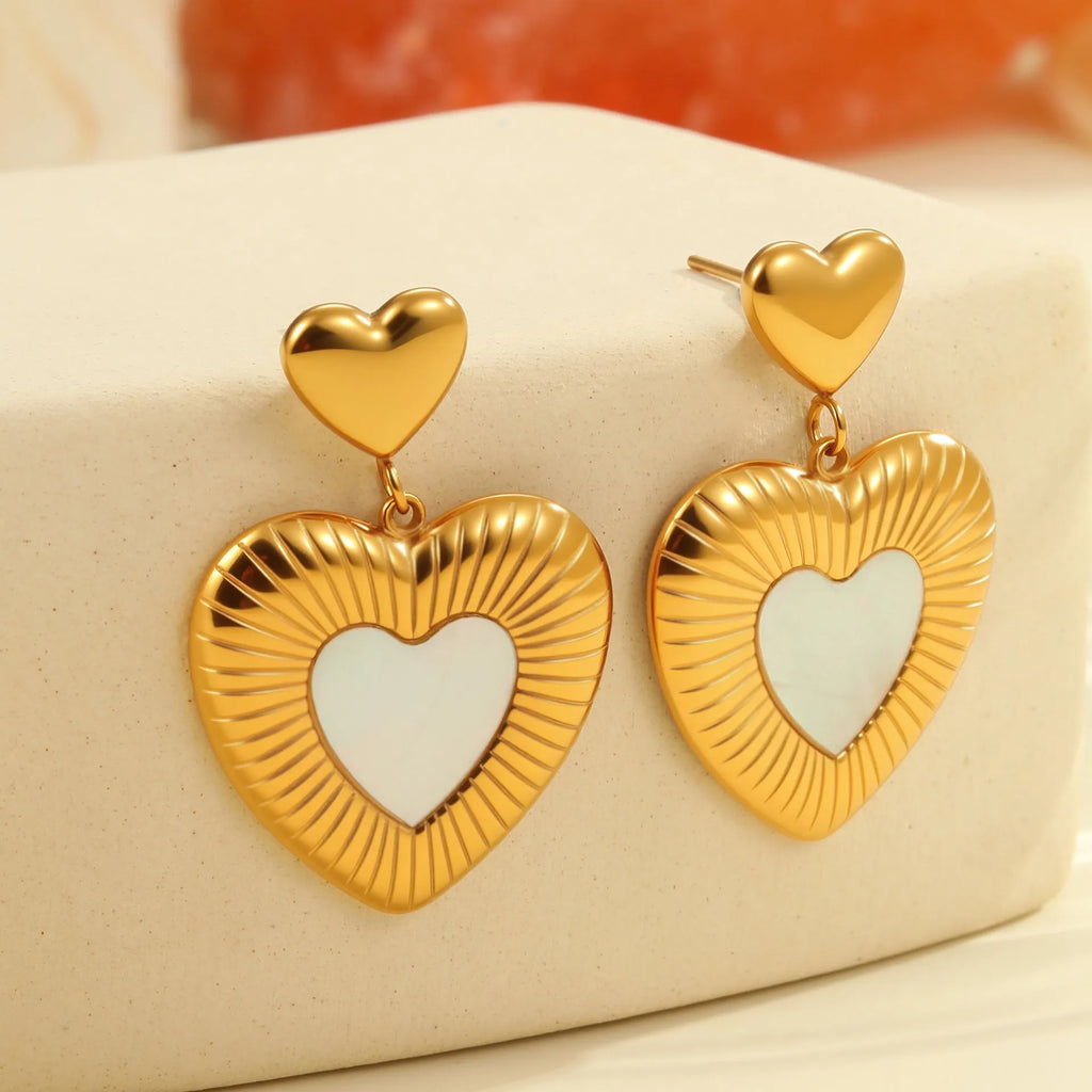 Gold heart-shaped stainless steel earrings with 18K electroplated finish for women's fashion wear