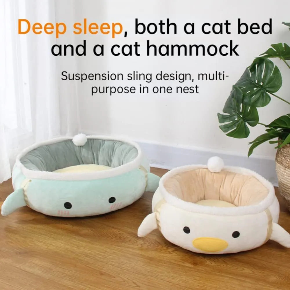 Green chick dinosaur shaped cat bed with straps that can be used flat or hung as a hammock