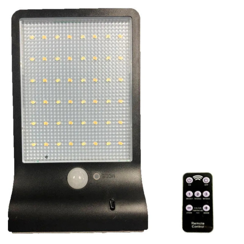 Outdoor solar garden light with LED illumination and waterproof IP65 rating in black or white finish