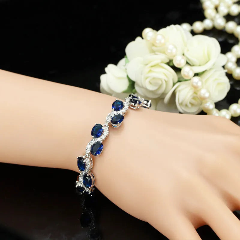 Copper-plated bracelet with gold electroplating and zircon stones in geometric design