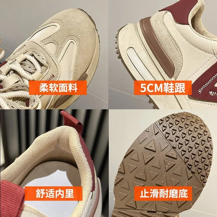 Women's black platform trainers with round toe and lace-up design, showing rubber sole