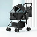 Black folding pet cart with detachable design and metal construction showing large capacity interior