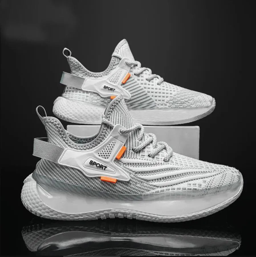 Men's white low-top lace-up sneakers with a woven mesh upper and flat rubber platform sole