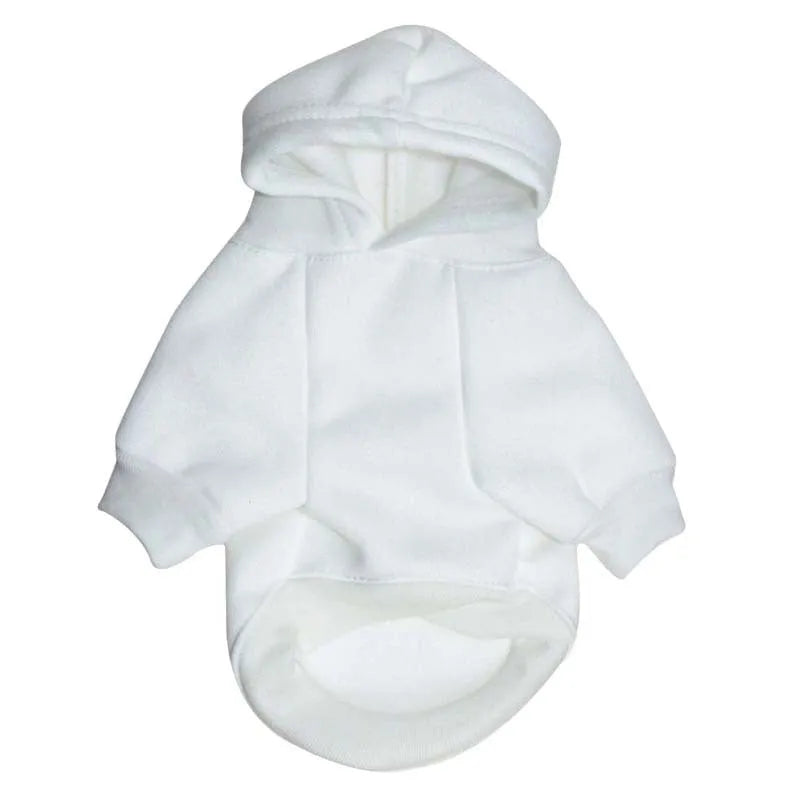 Small dog wearing a fleece hooded sweater in red, standing on a white background