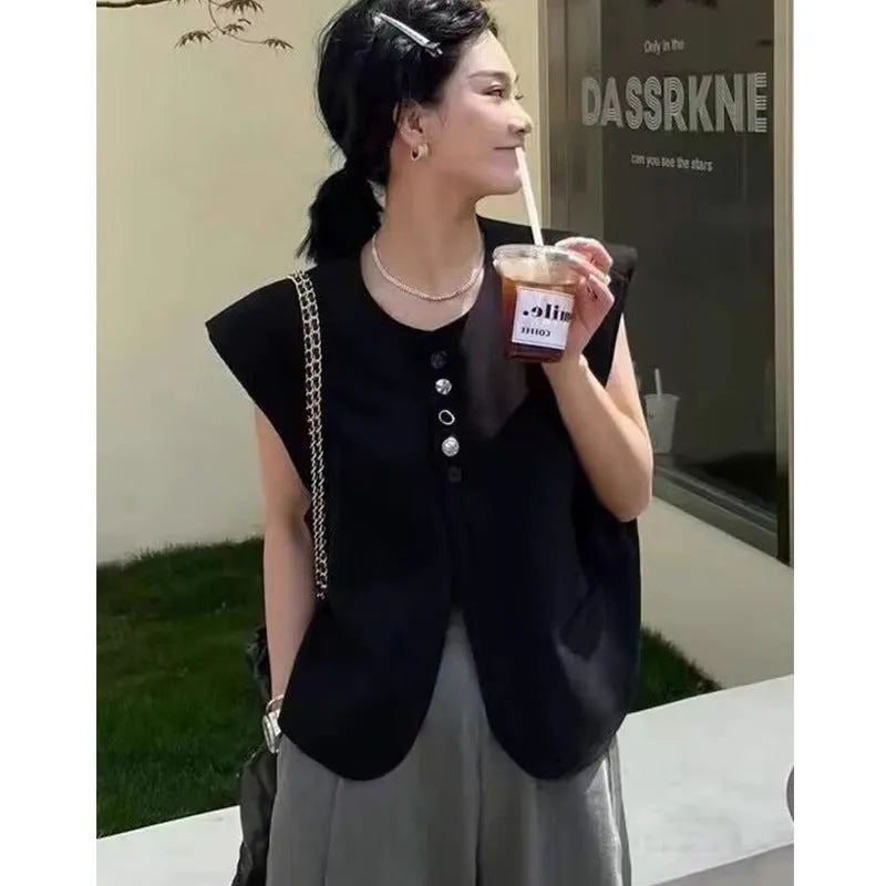 Women's polyester vest in milky white with pocket detail and loose fit design