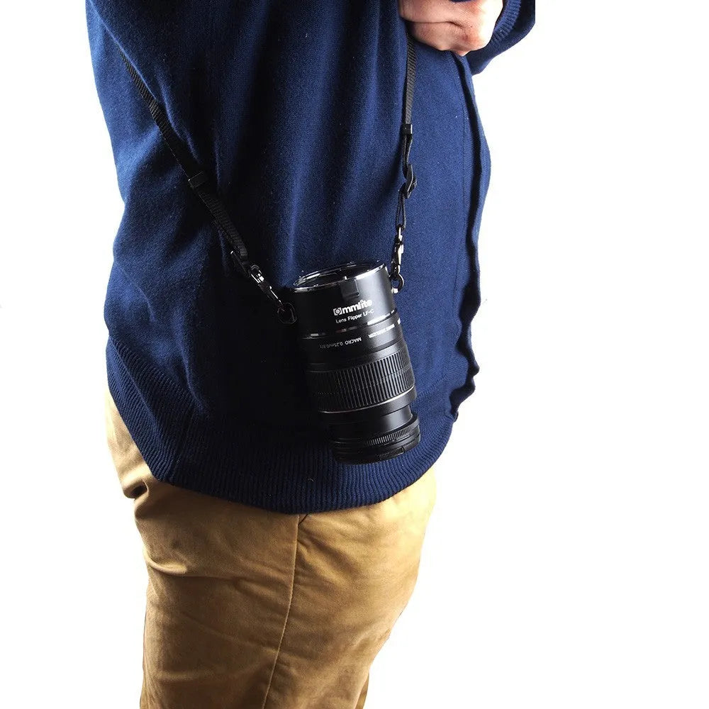 Nikon E-mount camera lens flipper with aluminium body and cotton shoulder strap