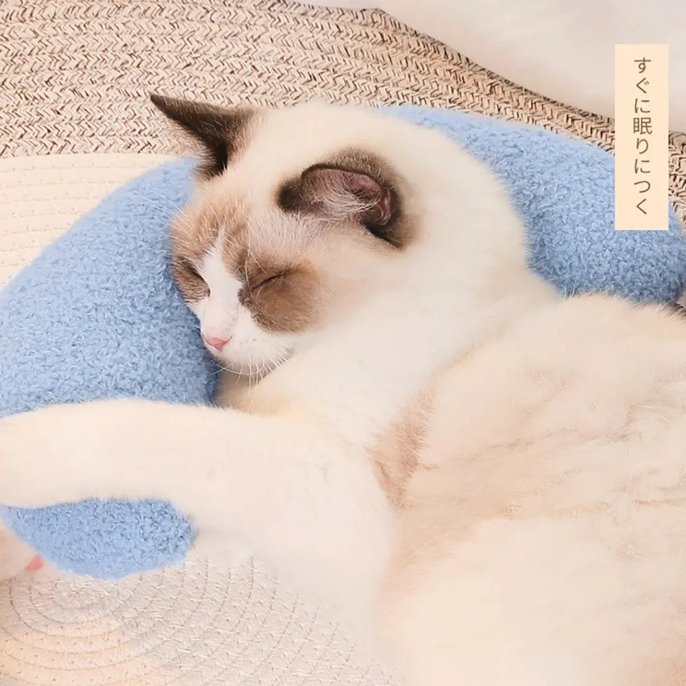 U-shaped blue cat pillow with adjustable collar for cervical support during feline sleep