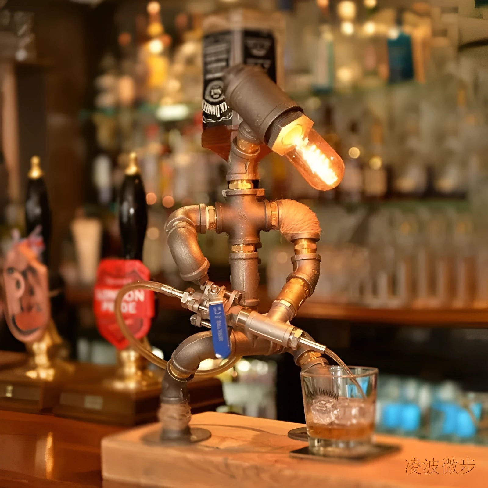 Industrial vintage table lamp shaped like a robot made from iron water pipes in a retro colour.