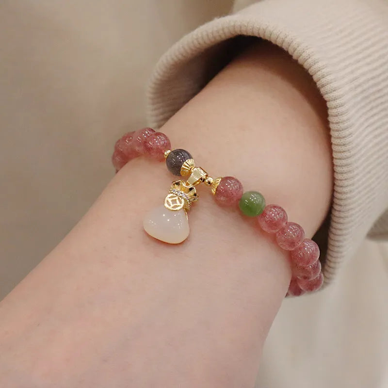 Strawberry quartz women's bracelet with geometric design, peace buckle charm and safety buckle closure