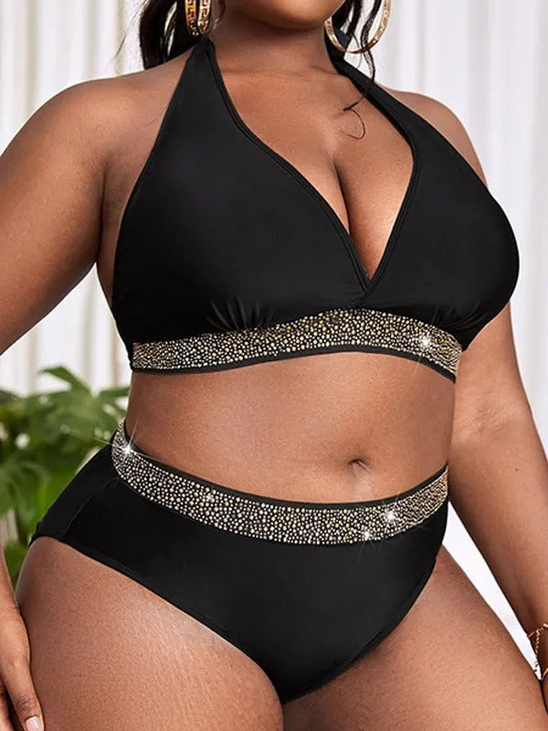 Black plus size women's bikini swimsuit with sleeveless bra and shorts on a mannequin.