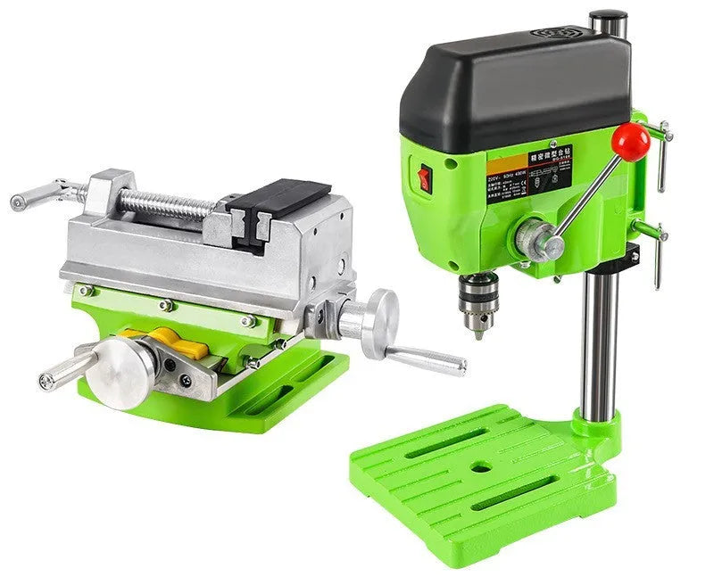Mini bench drill milling machine with AC power supply and included bench pliers on workbench