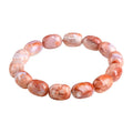 Natural cherry agate barrel bead bracelet with 10x14mm geometry and Ruyi design elements