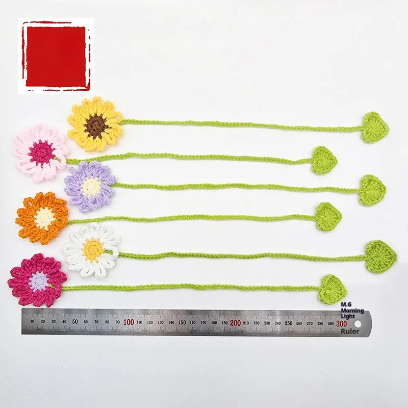 Hand-crocheted wool bookmark with daisy design on flexible wire in multiple colour options
