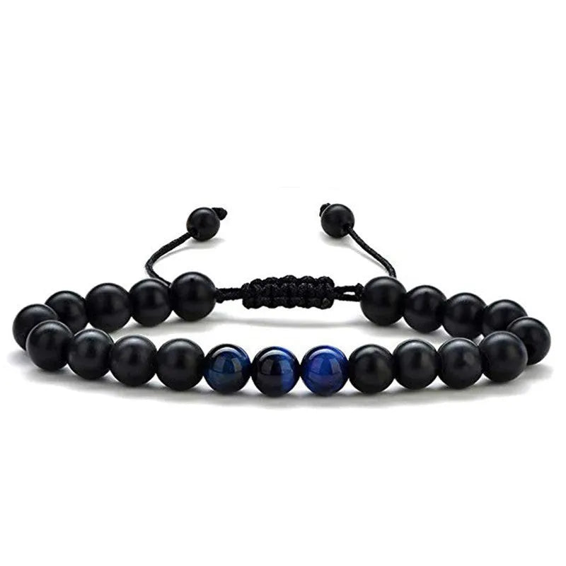 Geometric matte black agate couple bracelets with tiger eye beads, shown as a matching set.