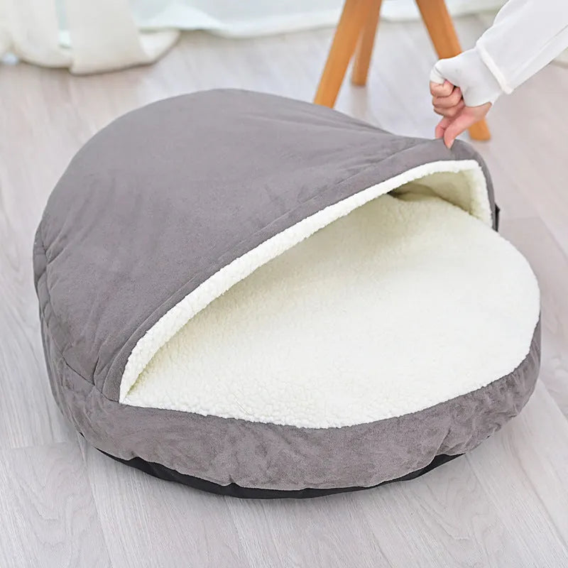Brown removable cloth dog kennel bed shown in a small S size on a wooden floor.