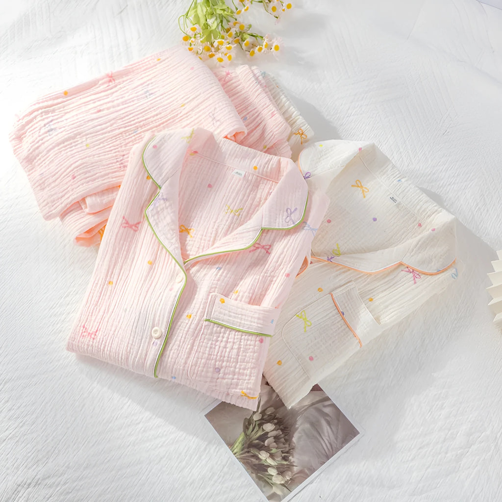 Women's long-sleeved cotton pyjama set in lightweight fabric available in pink or beige