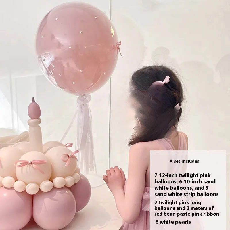 DIY balloon bouquet decoration kit with round balloons for cake toppers, showing one complete set.