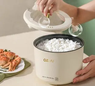 Miniature round automatic rice cooker with 2L capacity and steaming function for one to two persons