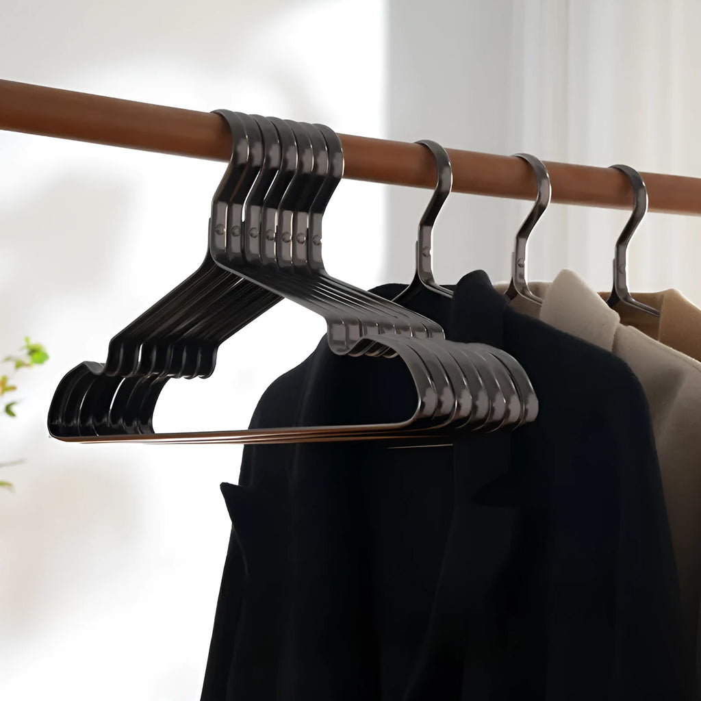 Elegant black modern clothes hanger with non-slip anti-rust surface for shirts and trousers.
