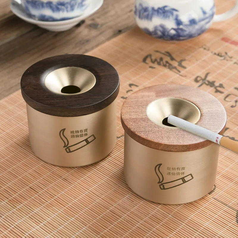 Brass ashtray with wooden lid featuring retro design for living room decor