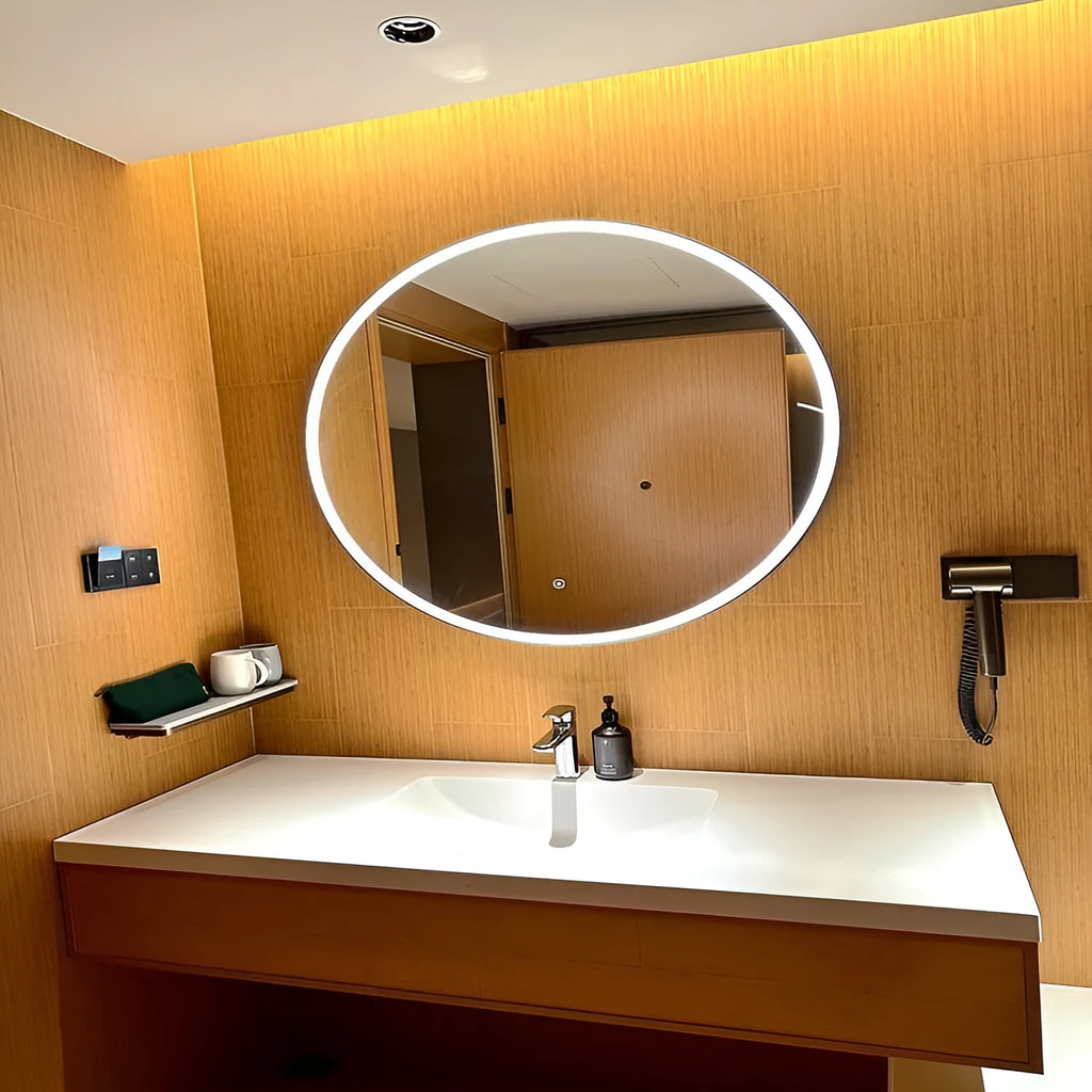 Round black aluminium frame LED bathroom mirror mounted on wall with touch control.