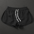 Men's loose fit beach shorts in polyester available in orange red, fluorescent green and black colours