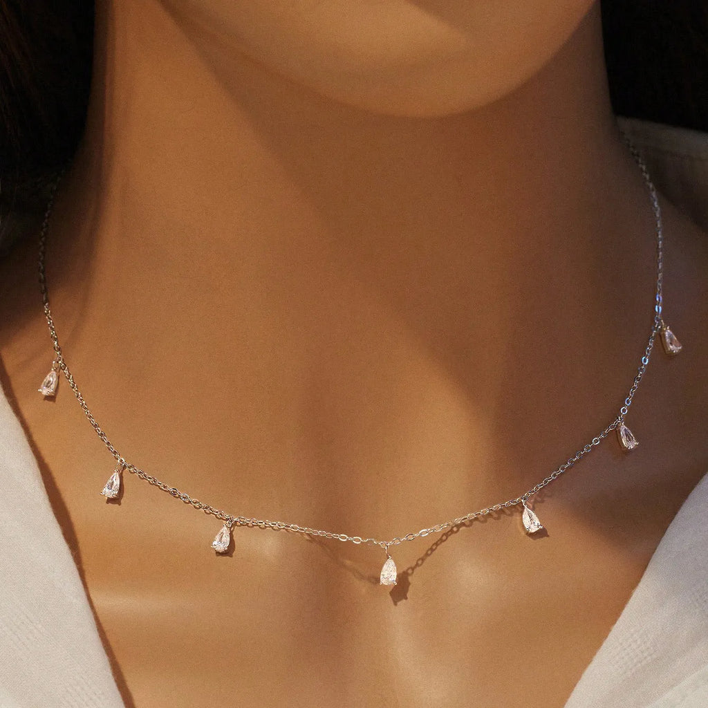 925 silver drop-shaped artificial zircon pendant necklace with an O-shaped chain on a model, showing the adjustable length.