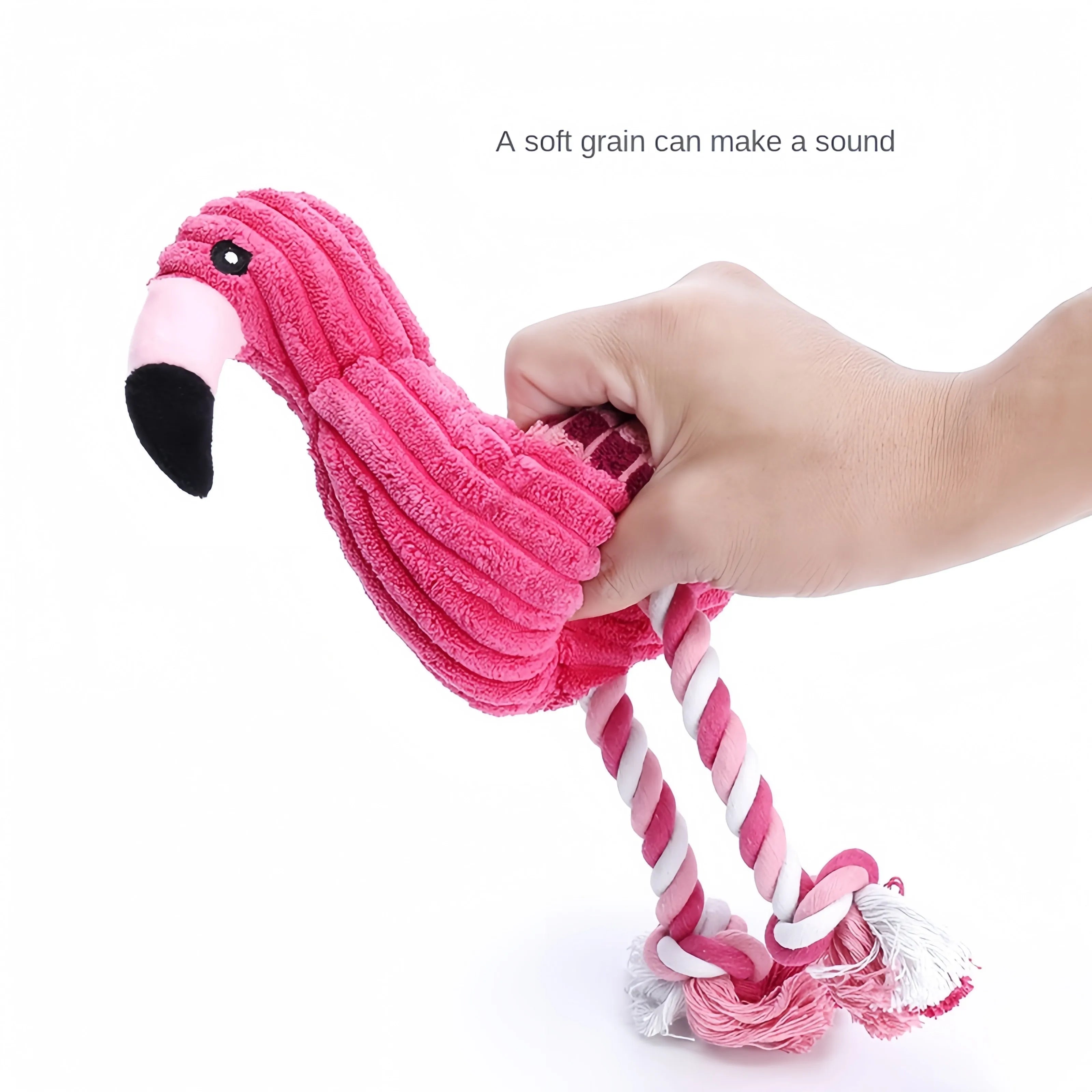 Pink animal-shaped corduroy plush dog toy with a squeaker inside