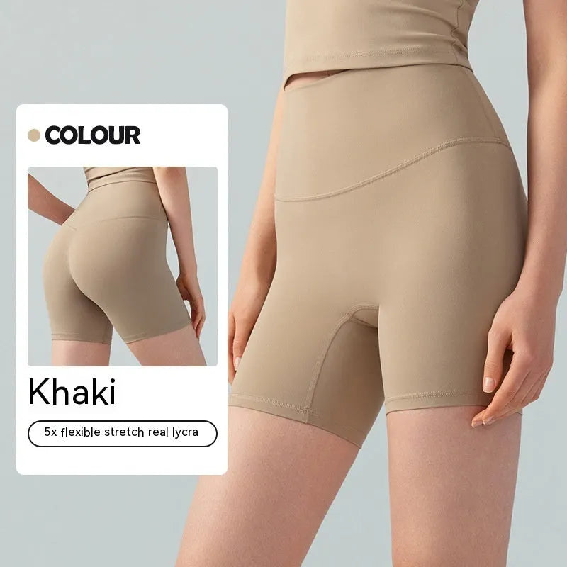 Women's high waist leaf green Lycra yoga shorts for fitness and cycling.
