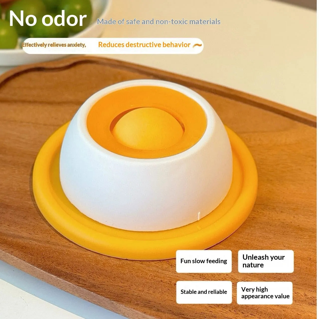 Yellow anti-spill slow feeder cat toy treat dispenser for cats on floor