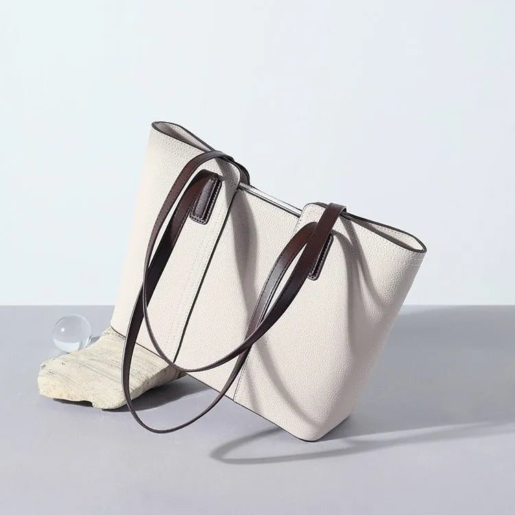 Women's genuine leather commuter shoulder bag in khaki colour with sandwich pocket and internal organisation