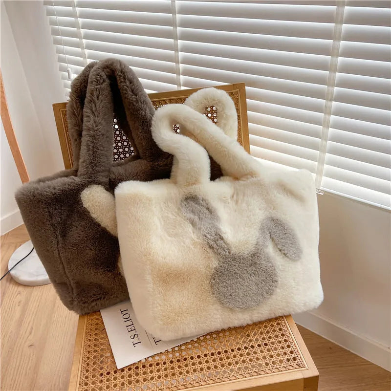 Plush shoulder bag with cartoon rabbit ears design in solid colour options
