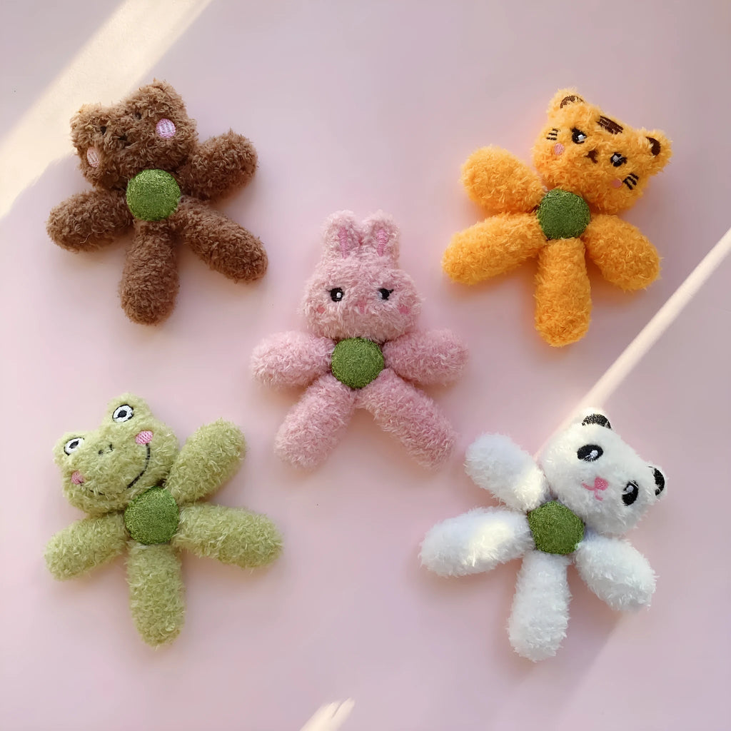 Edible catnip ball chewing toy for cats with plush animal design for dental enrichment