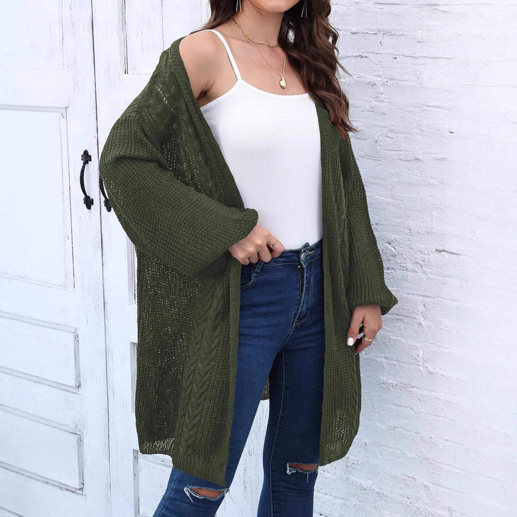 Women's loose acrylic sweater coat in solid colour on hanger