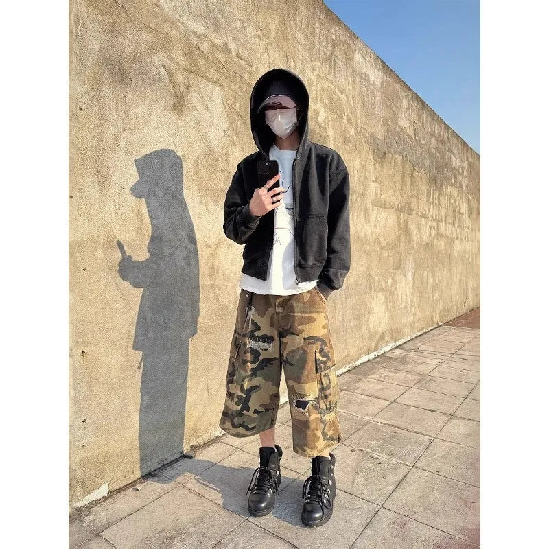 Men's camouflage jeans with patch and ripped detailing in straight-leg cropped style