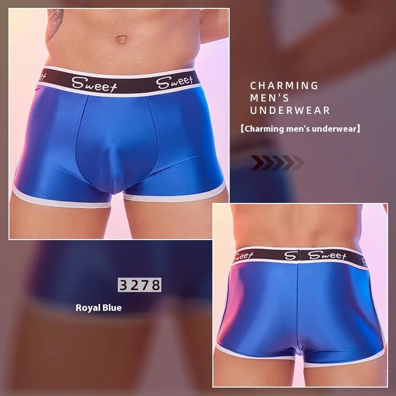 Men's shiny silky nylon boxer shorts in black, white, and sapphire blue colours showing breathable construction
