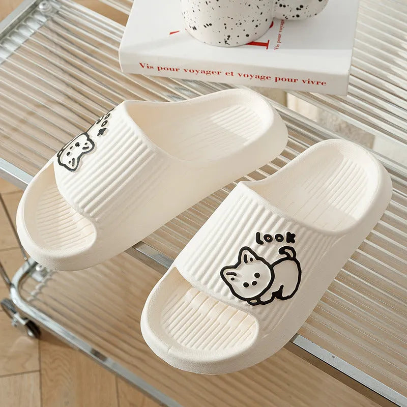 Women's green cat slippers with thick EVA platform sole, shown from above.